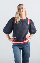 Something Like That Top

Chic and Comfortable for Any Occasion

Introducing the Something Like That Top, a stylish navy top featuring puff sleeves and red and white stripe detailing. Made from a textured soft material, this top is perfect for adding a touch of chic elegance to your everyday wardrobe.

Fabric: 97% Polyester, 3% Spandex

Size Guide: Fits True To Size, Model is Wearing a Size S

Available at our boutiques in Chicago, Lake Geneva, and Milwaukee. (Item availability may vary by location.)