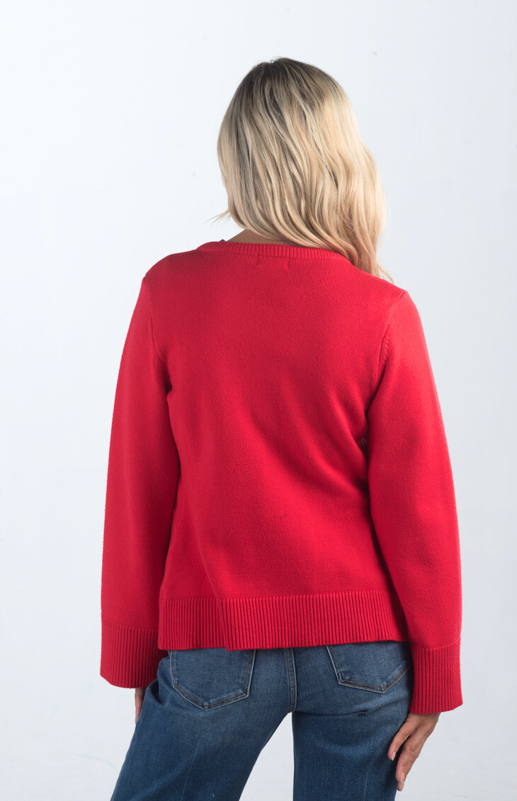 Introducing the Pamelia Wide Sleeve Cardigan, a vibrant red cardigan that effortlessly combines comfort with style. Featuring wide sleeves and a button-up design, this cardigan is perfect for layering and adding a pop of color to your wardrobe.

Fabric: 50% Viscose, 27% Polyester, 23% Polyamide

Size Guide: Fits True To Size, Model is Wearing a Size S

Available at our boutiques in Chicago, Lake Geneva, and Milwaukee. (Item availability may vary by location.)