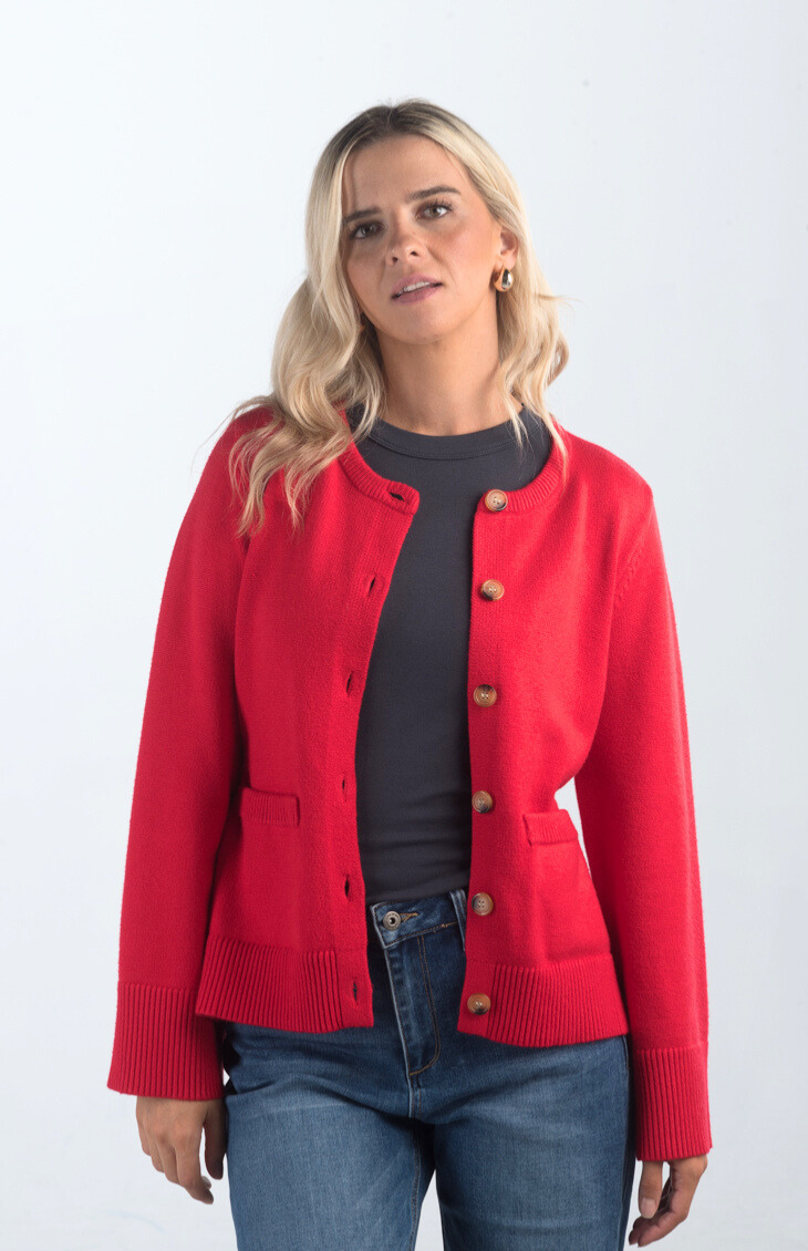 Introducing the Pamelia Wide Sleeve Cardigan, a vibrant red cardigan that effortlessly combines comfort with style. Featuring wide sleeves and a button-up design, this cardigan is perfect for layering and adding a pop of color to your wardrobe.

Fabric: 50% Viscose, 27% Polyester, 23% Polyamide

Size Guide: Fits True To Size, Model is Wearing a Size S

Available at our boutiques in Chicago, Lake Geneva, and Milwaukee. (Item availability may vary by location.)