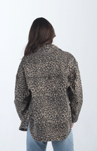 Introducing the Bowie Leopard Shacket, a trendy leopard print shacket. This button-down denim jacket features a bold leopard print, making it a standout piece for layering and adding flair to any outfit.

Fabric: 98% Cotton, 2% Spandex

Size Guide: Fits True To Size, Model is Wearing a Size S

Available at our boutiques in Chicago, Lake Geneva, and Milwaukee. (Item availability may vary by location.)