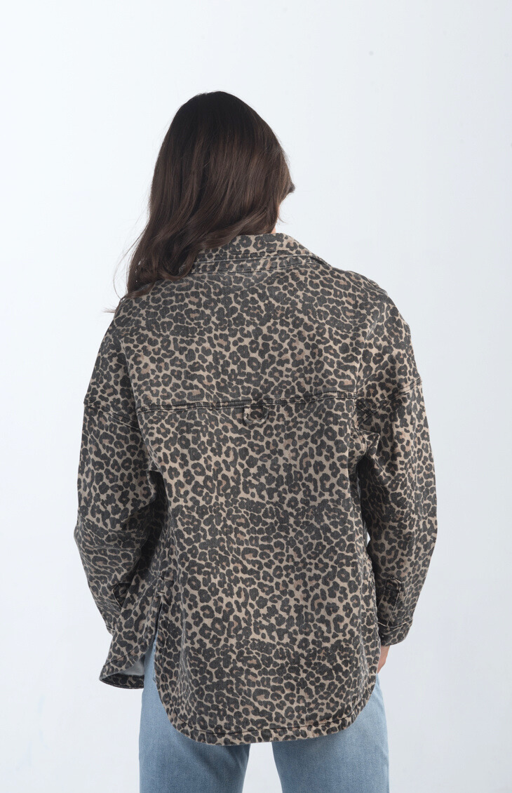 Introducing the Bowie Leopard Shacket, a trendy leopard print shacket. This button-down denim jacket features a bold leopard print, making it a standout piece for layering and adding flair to any outfit.

Fabric: 98% Cotton, 2% Spandex

Size Guide: Fits True To Size, Model is Wearing a Size S

Available at our boutiques in Chicago, Lake Geneva, and Milwaukee. (Item availability may vary by location.)