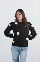 Introducing the Be Different Sweater, a cozy black sweater adorned with white flowers, perfect for adding a touch of charm to your wardrobe. With its soft material, long sleeves, and crew neckline, this sweater offers both comfort and style, making it ideal for any casual outing.

Fabric: 52% Acrylic, 28% Nylon, 20% Polyester

Size Guide: Fits True To Size, Model is Wearing a Size S

Available at our boutiques in Chicago, Lake Geneva, and Milwaukee. (Item availability may vary by location.)