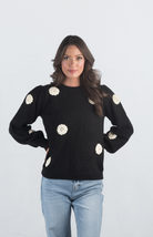 Introducing the Be Different Sweater, a cozy black sweater adorned with white flowers, perfect for adding a touch of charm to your wardrobe. With its soft material, long sleeves, and crew neckline, this sweater offers both comfort and style, making it ideal for any casual outing.

Fabric: 52% Acrylic, 28% Nylon, 20% Polyester

Size Guide: Fits True To Size, Model is Wearing a Size S

Available at our boutiques in Chicago, Lake Geneva, and Milwaukee. (Item availability may vary by location.)