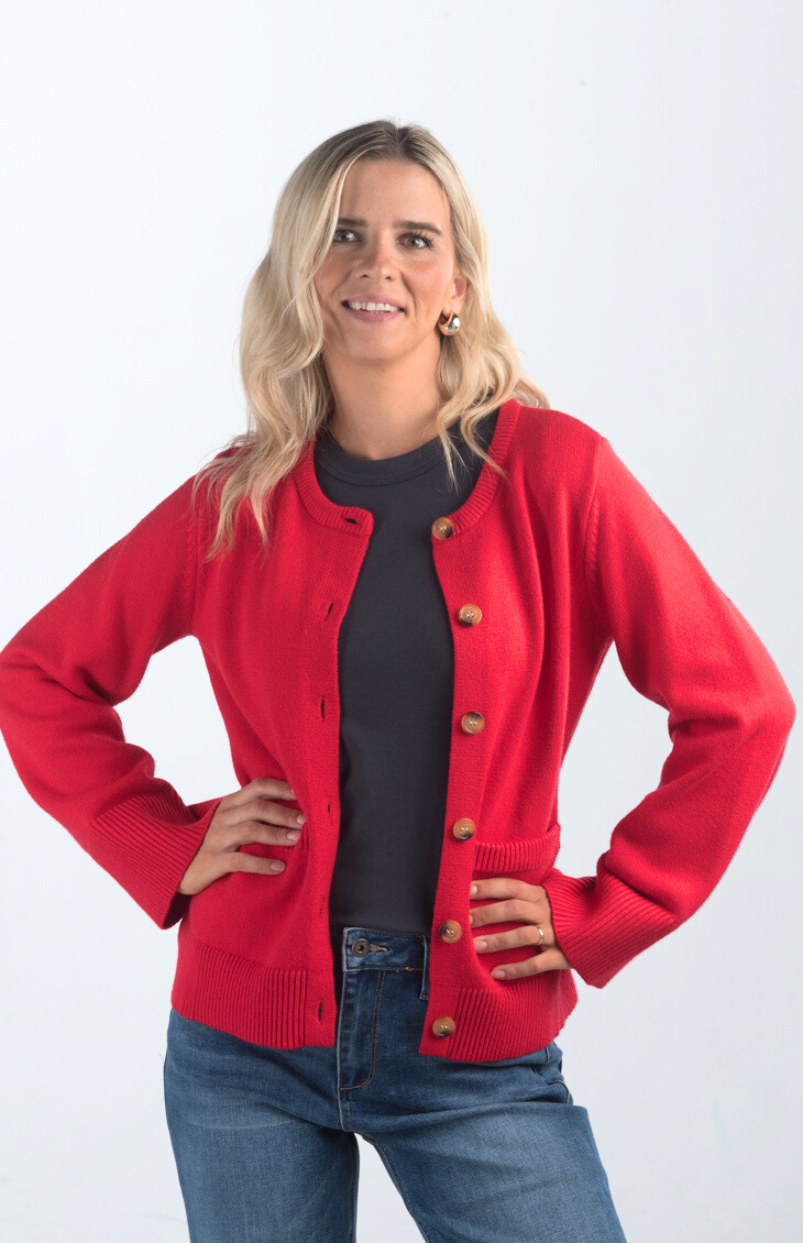 Introducing the Pamelia Wide Sleeve Cardigan, a vibrant red cardigan that effortlessly combines comfort with style. Featuring wide sleeves and a button-up design, this cardigan is perfect for layering and adding a pop of color to your wardrobe.

Fabric: 50% Viscose, 27% Polyester, 23% Polyamide

Size Guide: Fits True To Size, Model is Wearing a Size S

Available at our boutiques in Chicago, Lake Geneva, and Milwaukee. (Item availability may vary by location.)
