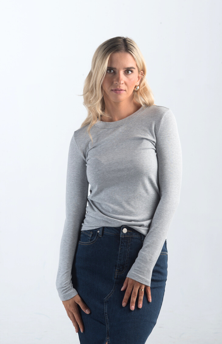 Introducing the Addison Tee, your go-to basic long-sleeved top crafted from ultra-soft material for ultimate comfort. Featuring a classic crew neckline, this versatile top is perfect for layering or wearing on its own. Available in a variety of neutral colors, the Addison Tee is a must-have staple for any wardrobe.

Fabric: 63% Polyester 32% Rayon 5% Spandex

Size Guide: Fits True To Size, Model is Wearing a Size S

Available at our boutiques in Chicago, Lake Geneva, and Milwaukee. 