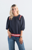 Something Like That Top

Chic and Comfortable for Any Occasion

Introducing the Something Like That Top, a stylish navy top featuring puff sleeves and red and white stripe detailing. Made from a textured soft material, this top is perfect for adding a touch of chic elegance to your everyday wardrobe.

Fabric: 97% Polyester, 3% Spandex

Size Guide: Fits True To Size, Model is Wearing a Size S

Available at our boutiques in Chicago, Lake Geneva, and Milwaukee. (Item availability may vary by location.)