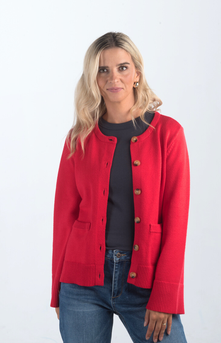 Introducing the Pamelia Wide Sleeve Cardigan, a vibrant red cardigan that effortlessly combines comfort with style. Featuring wide sleeves and a button-up design, this cardigan is perfect for layering and adding a pop of color to your wardrobe.

Fabric: 50% Viscose, 27% Polyester, 23% Polyamide

Size Guide: Fits True To Size, Model is Wearing a Size S

Available at our boutiques in Chicago, Lake Geneva, and Milwaukee. (Item availability may vary by location.)