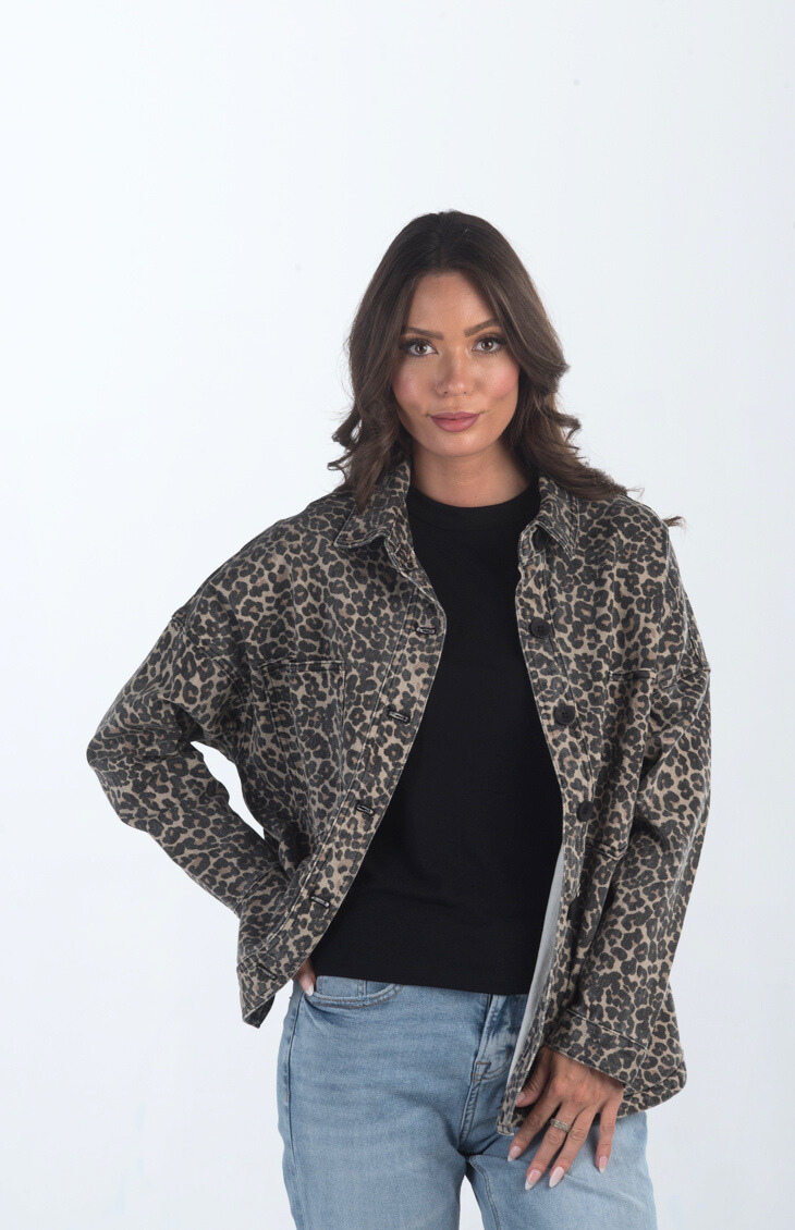 Introducing the Bowie Leopard Shacket, a trendy leopard print shacket. This button-down denim jacket features a bold leopard print, making it a standout piece for layering and adding flair to any outfit.

Fabric: 98% Cotton, 2% Spandex

Size Guide: Fits True To Size, Model is Wearing a Size S

Available at our boutiques in Chicago, Lake Geneva, and Milwaukee. (Item availability may vary by location.)