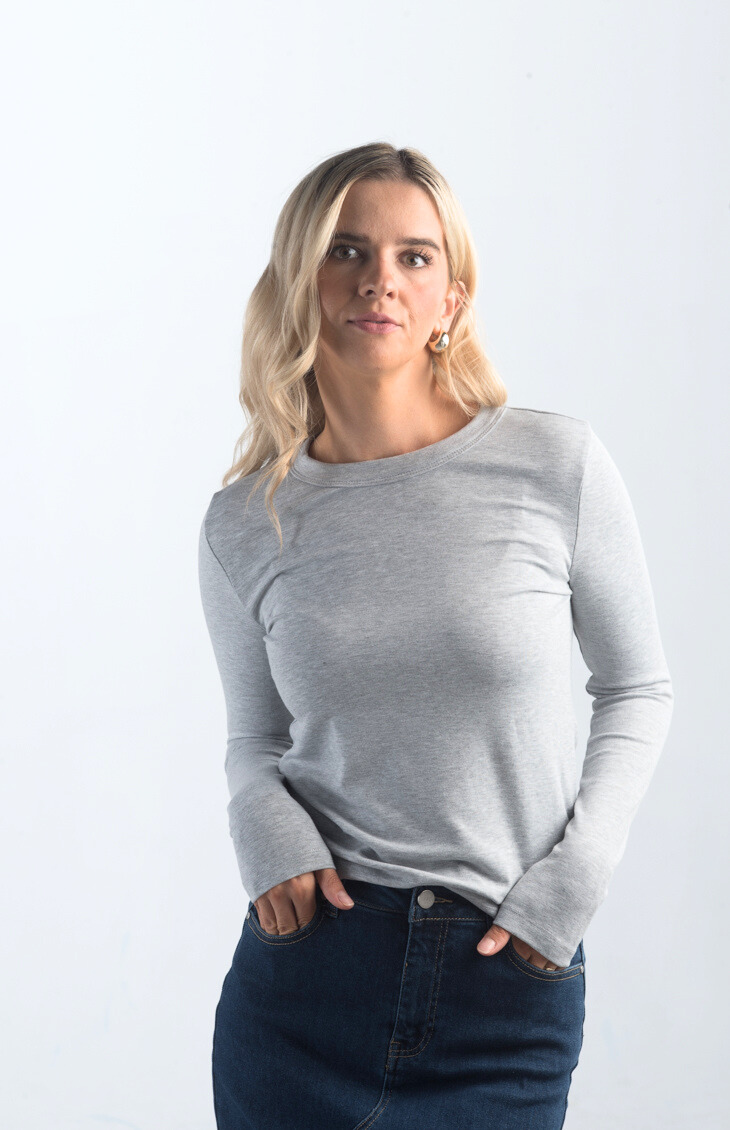 Introducing the Addison Tee, your go-to basic long-sleeved top crafted from ultra-soft material for ultimate comfort. Featuring a classic crew neckline, this versatile top is perfect for layering or wearing on its own. Available in a variety of neutral colors, the Addison Tee is a must-have staple for any wardrobe.

Fabric: 63% Polyester 32% Rayon 5% Spandex

Size Guide: Fits True To Size, Model is Wearing a Size S

Available at our boutiques in Chicago, Lake Geneva, and Milwaukee. 