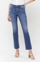 Stay comfortable and stylish with the Flying Monkey High Rise Slim Straight Jeans. These high-waisted jeans are crafted with comfort stretch denim to ensure a flattering fit, featuring minor distressed details and a straight leg for a sleek look. Available at our boutique in Chicago, Lake Geneva, and Milwaukee.