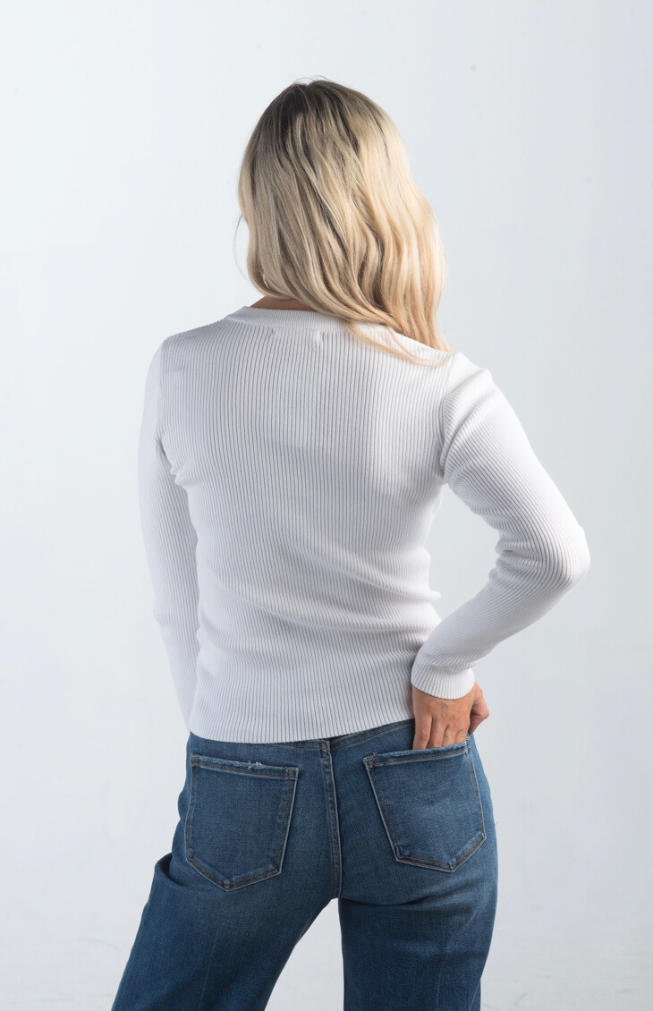 Introducing the Casually Cool Rib Sweater, a versatile ribbed sweater available in multiple colors. With long sleeves and a crew neckline, this sweater offers a chic and comfortable fit, making it the ideal basic piece for layering or wearing on its own.

Fabric: 70% Viscose, 30% Nylon

Size Guide: Fits True To Size, Model is Wearing a Size S

Available at our boutiques in Chicago, Lake Geneva, and Milwaukee. (Item availability may vary by location.)